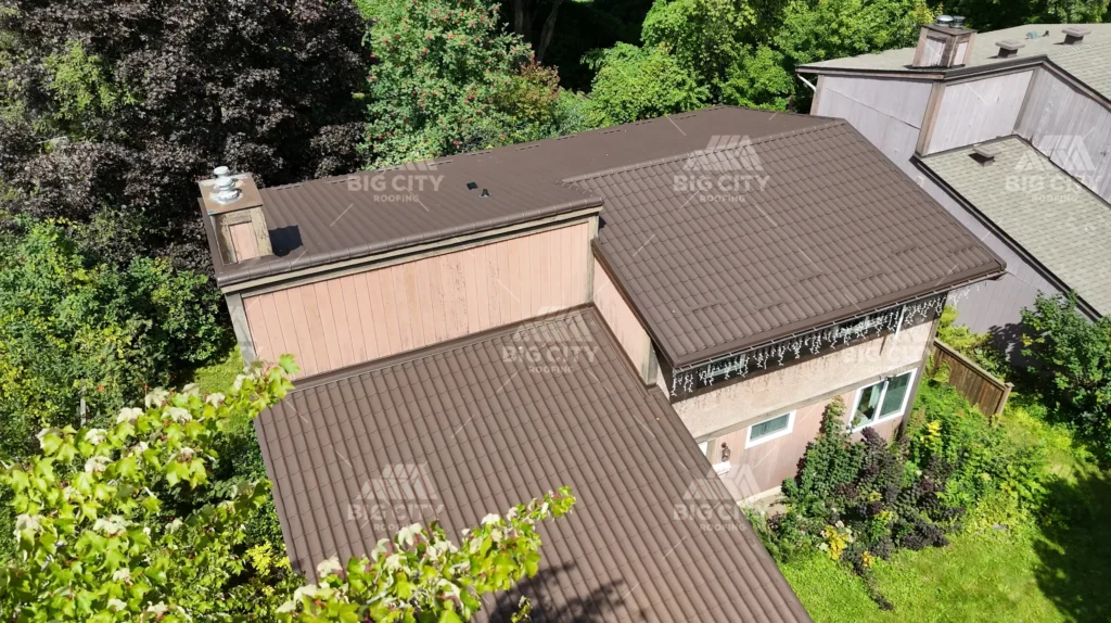 Kanata house with a new chocolate brown Monterey metal roof